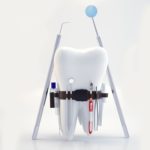 Vector photo of Tooth with dental tools