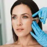 Photo of beautiful woman getting treatment