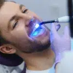 Closeup portrait patient in dental office