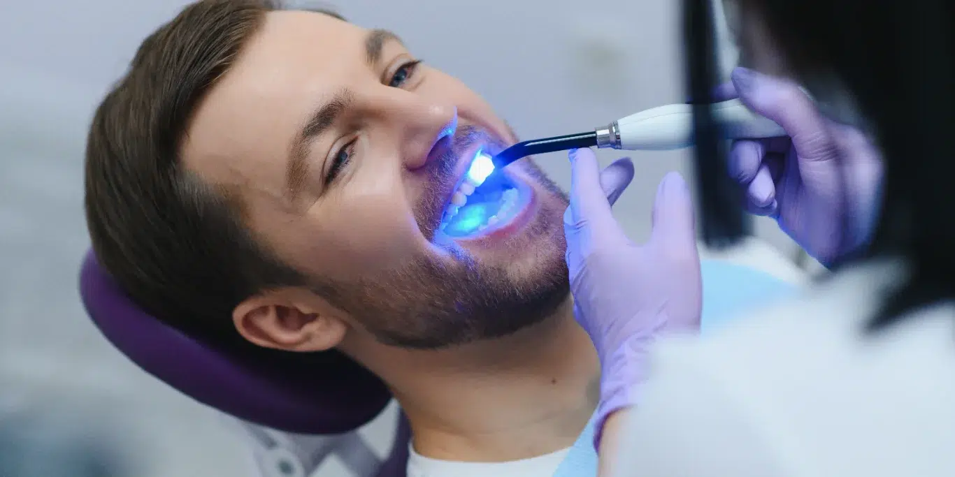 Closeup portrait patient in dental office Closeup portrait patient in dental office